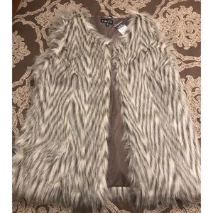 FAUX fur vest.